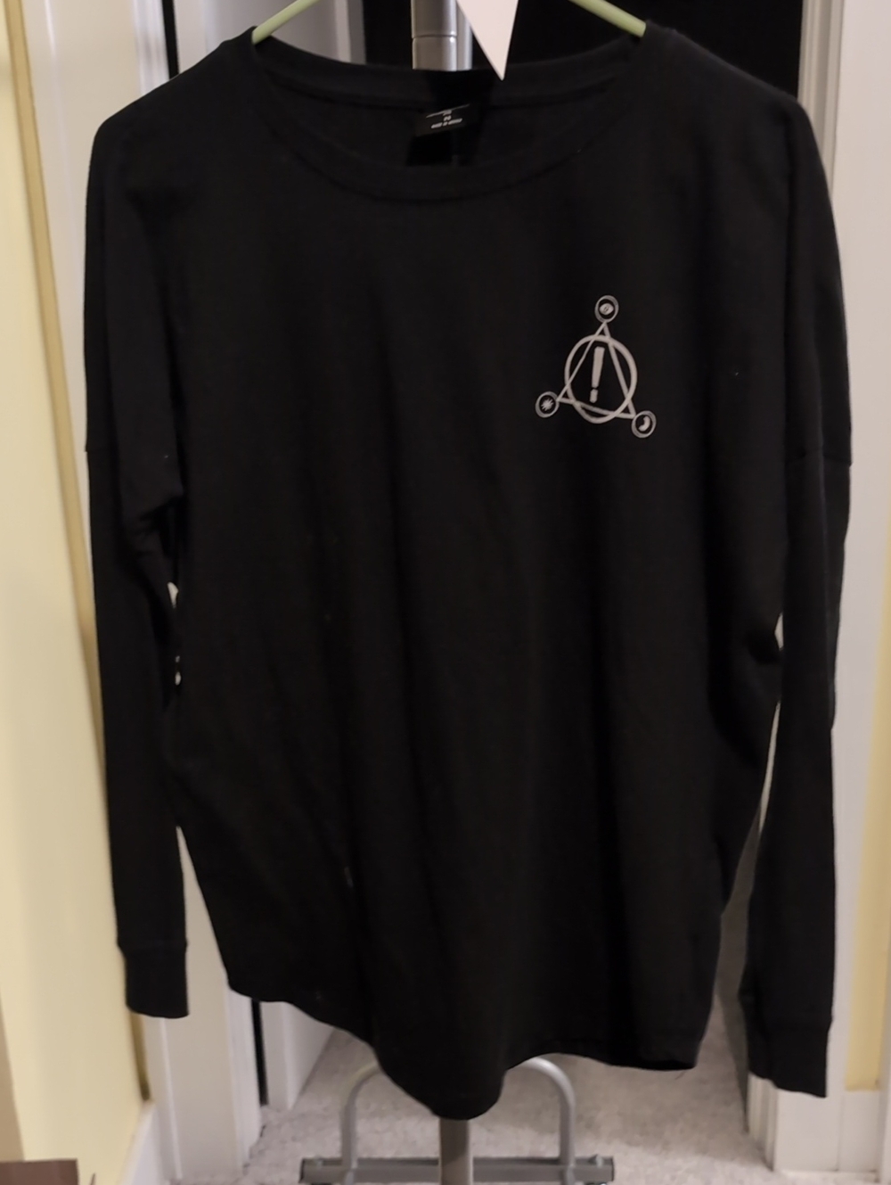 Black Long-Sleeve Graphic Tee with Minimal Chest Logo